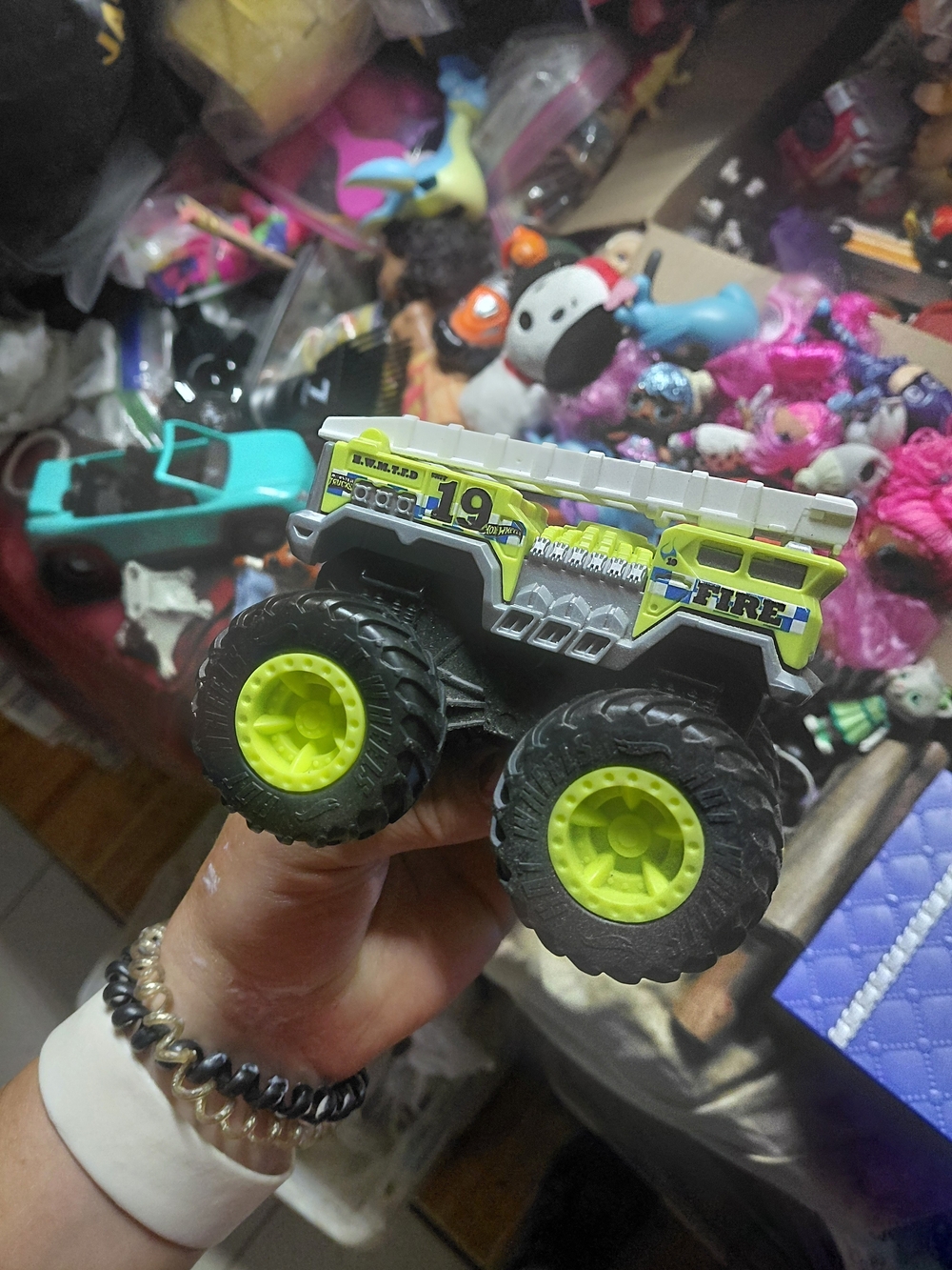 lime-green and silver Hot Wheels Rev Tredz 5 Alarm monster truck toy